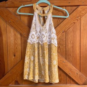 Woman’s yellow top